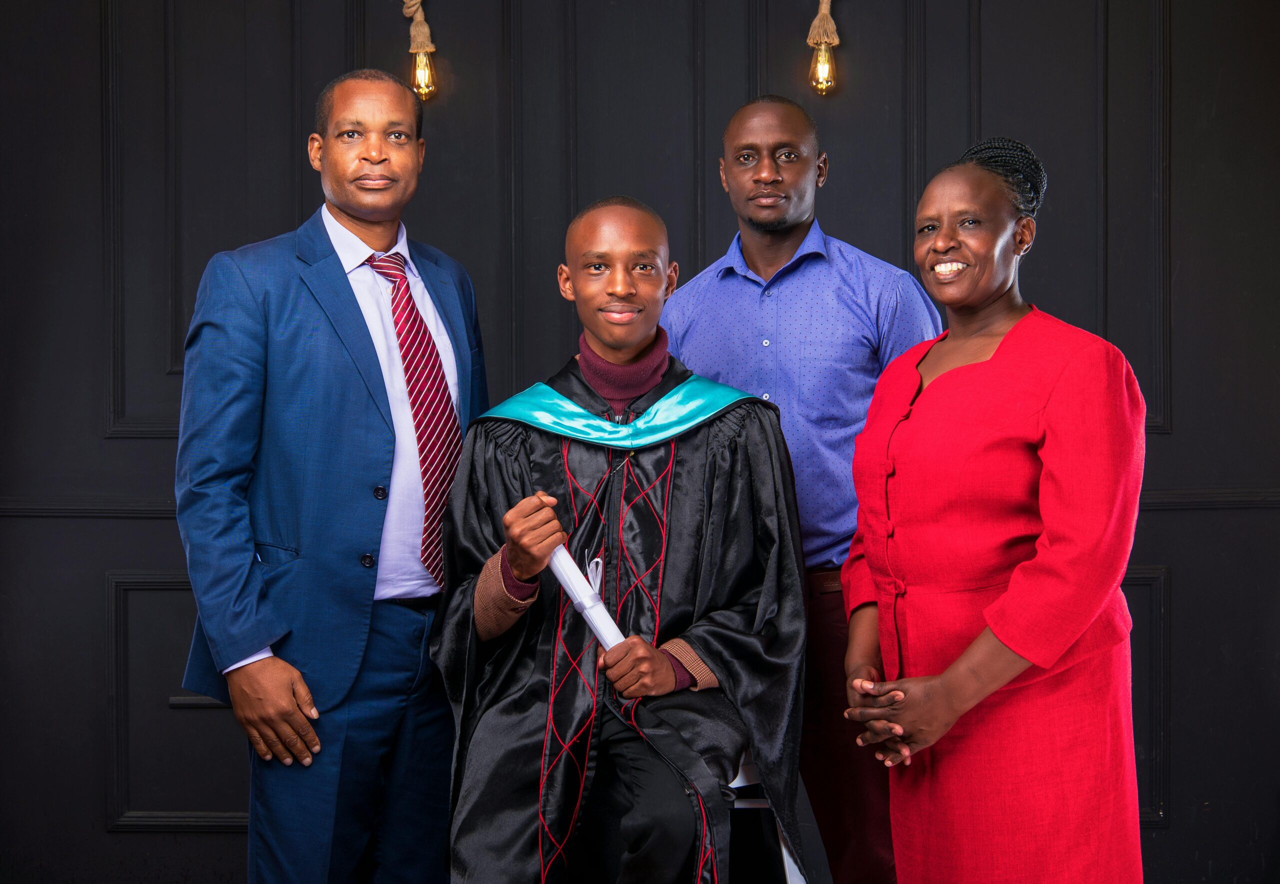 African American family proudly celebrating a graduation in Nairobi.